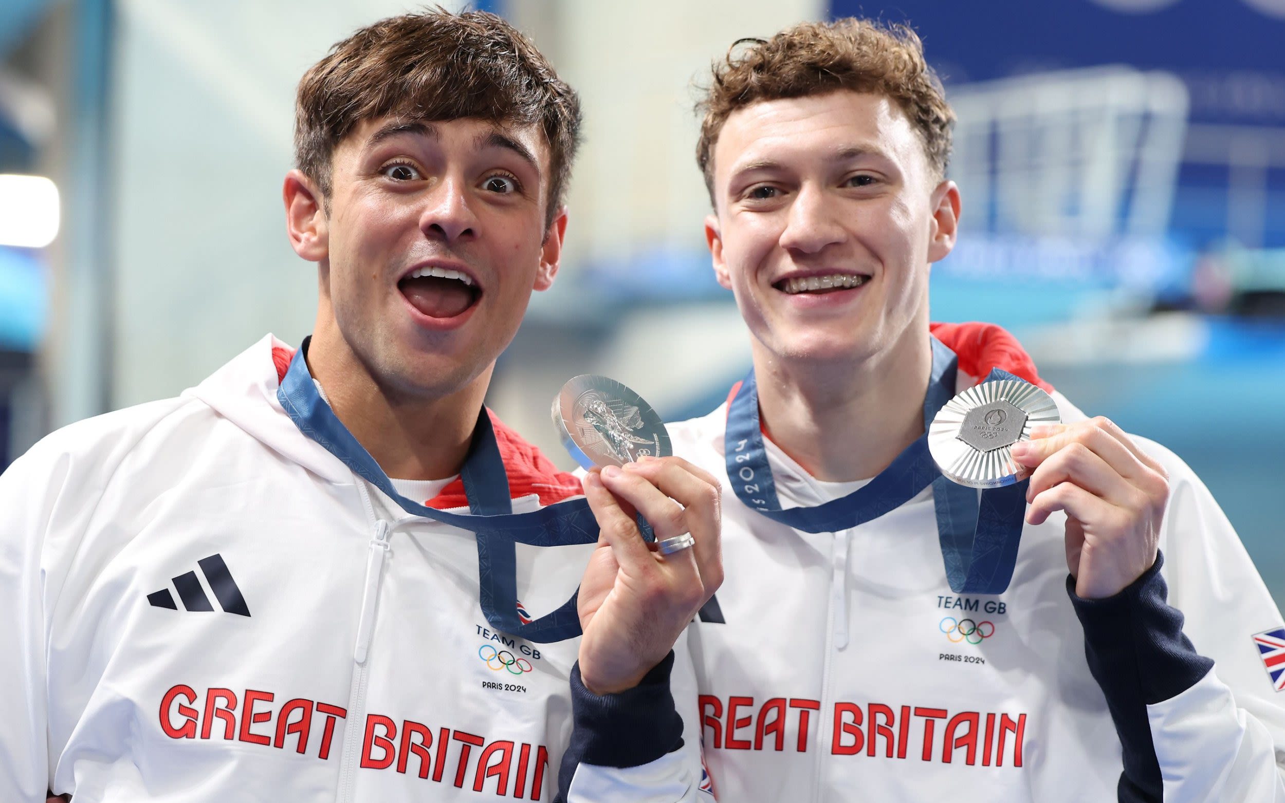 Tom Daley wins silver to complete set of Olympic medals — and is then soaked in fruit juice by son