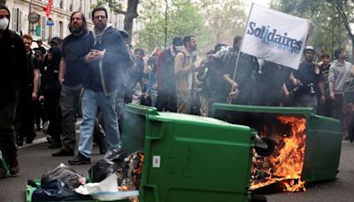 Riot police, protesters clash in Paris during May Day protests