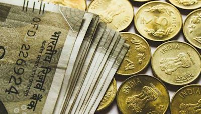 Rupee ends flat after hitting 3-month peak; oil firms’ dollar bids weigh