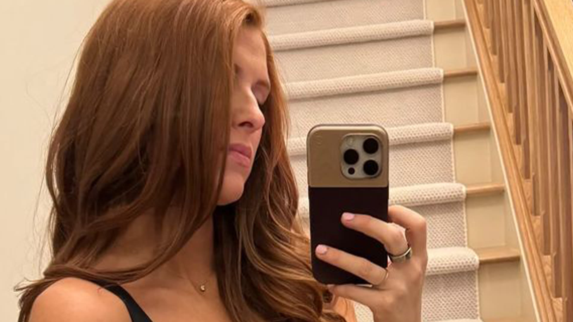 Audrey Roloff shows her massive baby bump as she strips down to black underwear