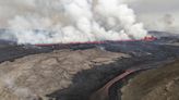 Iceland volcano spews streams of red lava toward an evacuated town