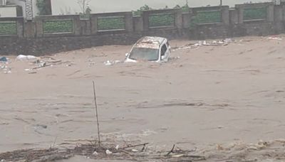 China evacuates entire town as record rains, winds lash its south