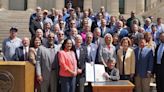 Workers compensation bill ceremoniously signed into law, expected to improve compensation process