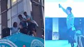 Jack Grealish nearly falls off Man City bus twice as players enjoy boozy party