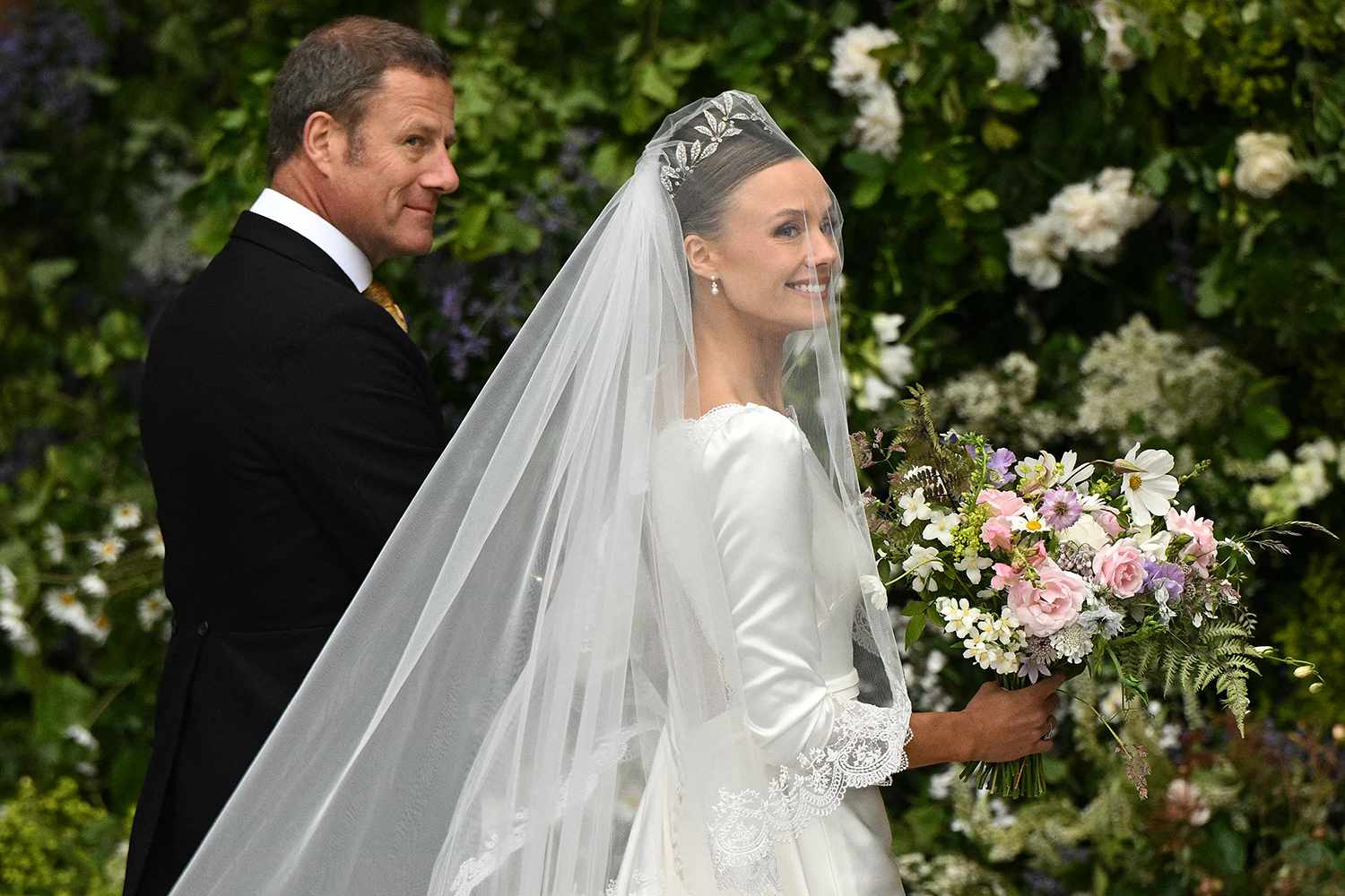 Olivia Henson Battles the Wind (in an Heirloom Tiara!) at Her High Society Wedding Attended by Royal Family