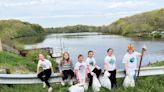 Volunteers bag trash around Veto Lake