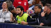 Caleb Williams, Keenan Allen, Rome Odunze front row at Chicago Sky preseason game