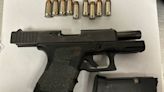 Loaded guns and a grenade found with airport passenger at SEA on Tuesday