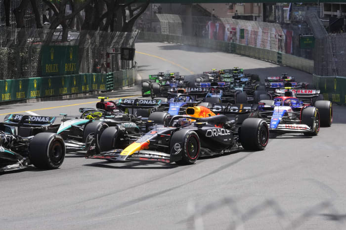 Big crash involving 3 cars on 1st lap of Monaco GP brings out red flag to temporarily halt race