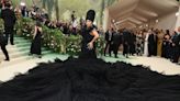 Commentary: Met Gala Stars Mocked as Absurd Outfits Leave Them 'Unable to Conquer a Flight of Stairs'