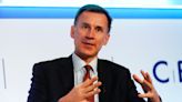 Hunt to tell Davos summit: Britain is on the up and open for business