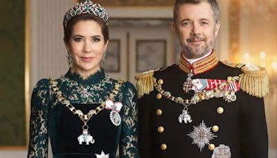 Four signals Queen Mary & King Frederik send with ‘wooden’ new portrait after affair rumours, claims body language pro