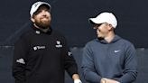 Open day three: Rory McIlroy supporting leader Shane Lowry after missing the cut