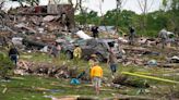 National Weather Service says three tornadoes raced across Iowa on Tuesday