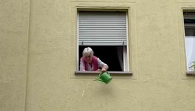 Fed up German pensioner pours water over drunk England fans