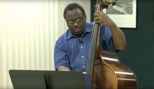 A musical quest: Whether teaching or playing, bassist James Hunter is happy