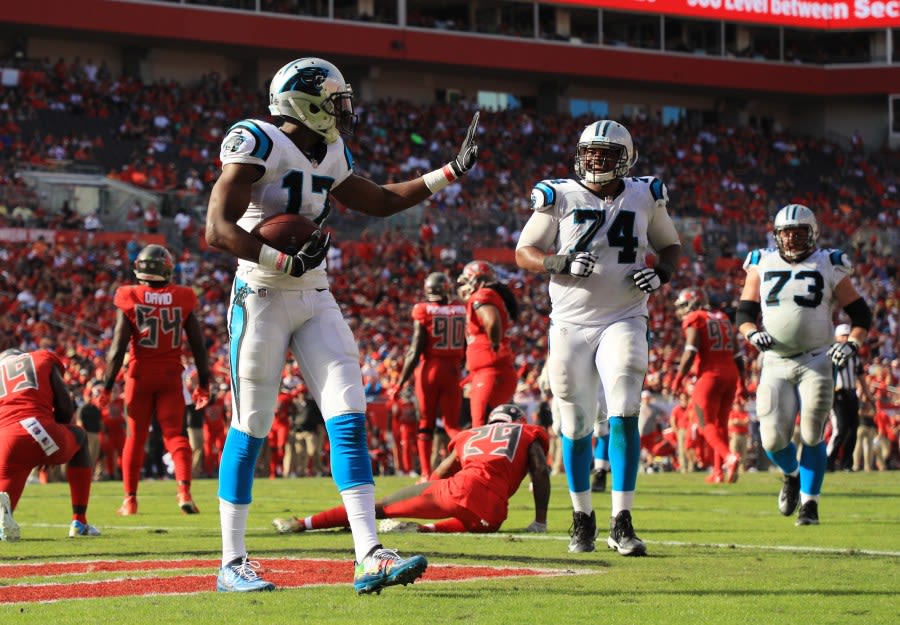 Former Panthers TE makes history going from the gridiron to the hardwood