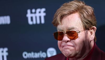 Elton John holds back tears in emotional first appearance since severe infection