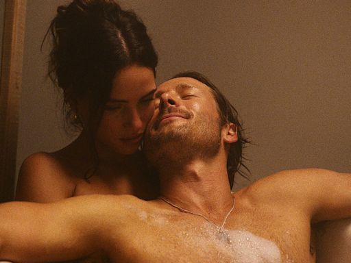 Adria Arjona Says She and Glen Powell Filmed ‘Hit Man’ Sex Scenes in Pain From ‘Crazy’ Rashes