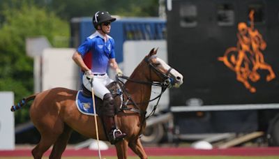 Prince William shows off his polo skills after Palace issues health update for Kate