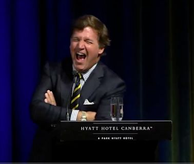 Tucker Carlson Takes on Australian Reporter After Searing Putin Question