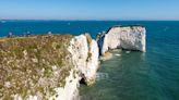 Boy having photo taken falls 60ft down Dorset cliff