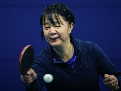 Chinese-Chilean table tennis player makes Olympics debut at age 58 in the Paris Games