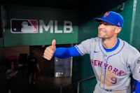 Nimmo returns from hotel room scare to drive in 2 runs as the Mets beat the Nationals 7-2 in 10