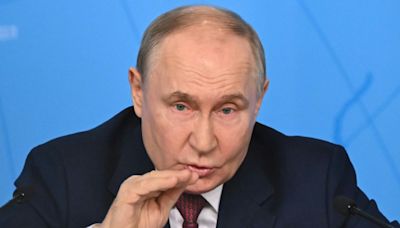 Putin says Ukraine must withdraw troops to start peace talks