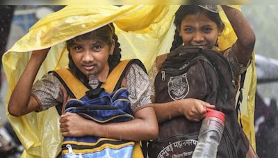 Schools shut in Karnataka, UP cities due to heavy rains. IMD predicts downpours in these states - CNBC TV18