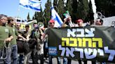 Plan to exempt Orthodox Israelis from military service prompts protests