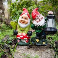 Gnomes that use solar panels to illuminate at night. They come in various poses and usually have LED lights installed. Perfect for eco-conscious garden owners.