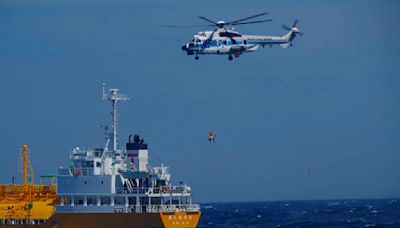 Woman swept to sea while swimming at a Japanese beach rescued 37 hours later and 50 miles away