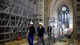 Notre Dame Cathedral will re-open to public after blaze in a year, Emmanuel Macron vows on visit