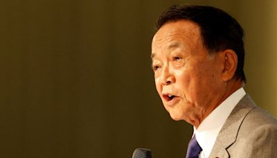 Trump meets with Japan's former prime minister Aso