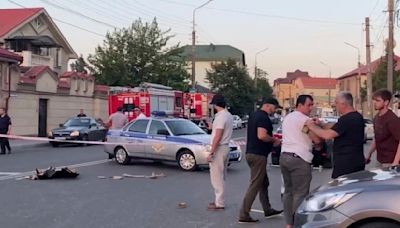 Gunmen kill police, priest and civilians in attacks on places of worship in Russia’s Dagestan