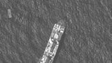 A US vessel and sections of a floating dock, off the war-torn Gaza Strip, seen in a satellite image courtesy of Maxar Technologies taken on April 29, 2024