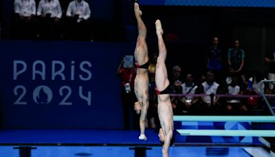 China makes it 2-for-2 in Olympic diving, leaving Britain's Tom Daley with a silver