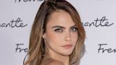 We didn’t recognise Cara Delevingne with this androgynous dark slicked hair transformation