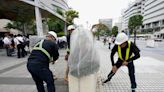 Typhoon Mawar inches closer to Japan threatening to bring heavy rains and winds