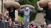 Chasing cheese wheels or lugging sacks of wool, U.K. competitors embrace quirky races