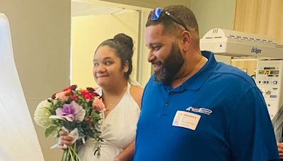 Pregnant bride gets married in hospital wearing ‘wedding dress’ of bed sheets