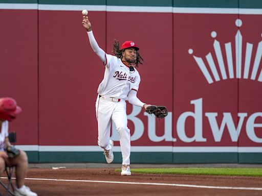 Top prospect James Wood singles in his first major league at-bat for the Nationals against the Mets