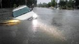 Heavy rains near Houston close schools and flood roadways as officials urge residents to evacuate