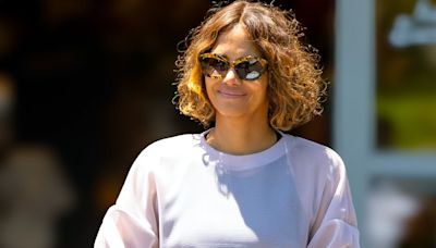 Halle Berry models a very sheer top and beams on LA grocery run
