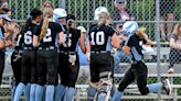 Zoey Gruber's arm, bat help Lansing Catholic softball claim district title