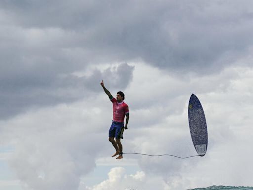 Greatest surf shot ever? Photographer describes Olympic coverage success