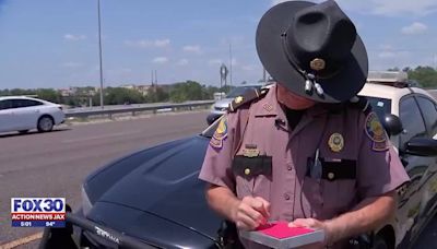 Florida Highway Patrol Auxiliary Unit helps broken-down cars on Memorial Day