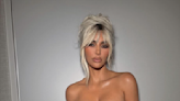 Kim Kardashian just underwent a major beauty transformation with butt-skimming red hair