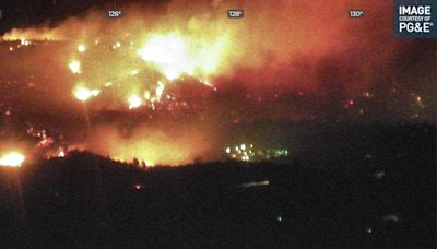 Fast-moving wildfire forces evacuations in Yosemite gateway town